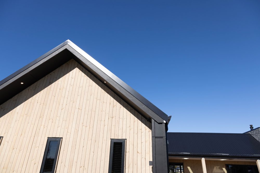 Board-and-batten clad new home at Mara Kai Place