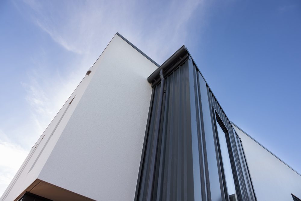White and dark-clad apartment block at 31 Newmark Street